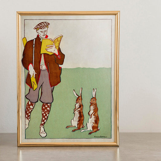 Man Reading A Book With Hares by Edward Penfield